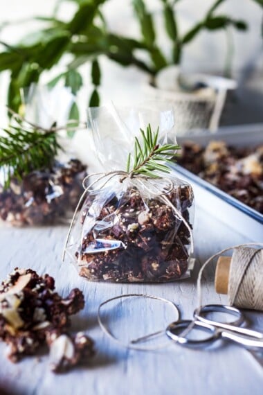 This Chocolate Bark is divinely delicious!  Made with chocolate chips, cashews, coconut, sesame seeds, and crystallized ginger, it is perfect for gifts and holiday gatherings.  Easy to make in under 30 minutes.  Adaptable, vegan, and gluten-free!