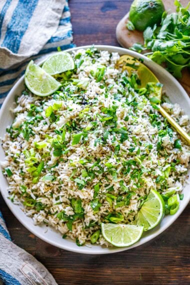 The best recipe for Cilantro Lime Rice with onion, garlic, lime, and cilantro, the perfect side dish for your Mexican feast! Better than Chipotle's. ;)