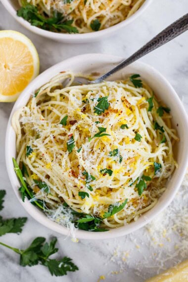 This bright and zesty Lemon Pasta recipe is studded with garlic and shallots, lemon zest, red pepper flakes, and optional pecorino cheese. Easy to make in under 25 minutes. Vegan and gluten-free adaptable.