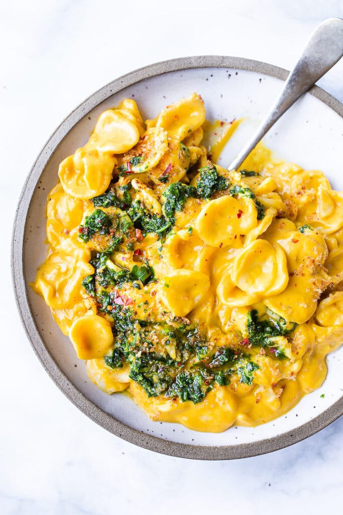 orecchiette pasta with carrot miso sauce, a carrot recipe with carrot top gremolata and toasted breadcrumbs.