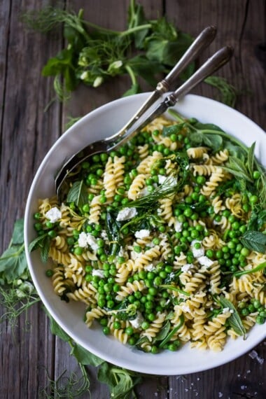This recipe for Pea Pasta with Mint, Lemon and Truffle Oil is simple to put together and a perfect light meal for Spring! Serve it warm as a main, or chilled as a salad. Vegan adaptable.&nbsp;