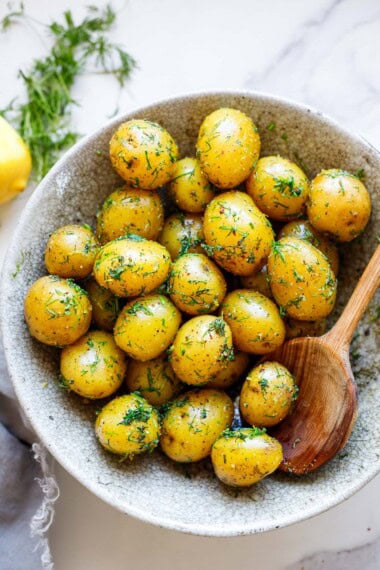 Finnish boiled potatoes with dill — a simple, traditional side dish made with tender new potatoes, fresh herbs, olive oil, and lemon.