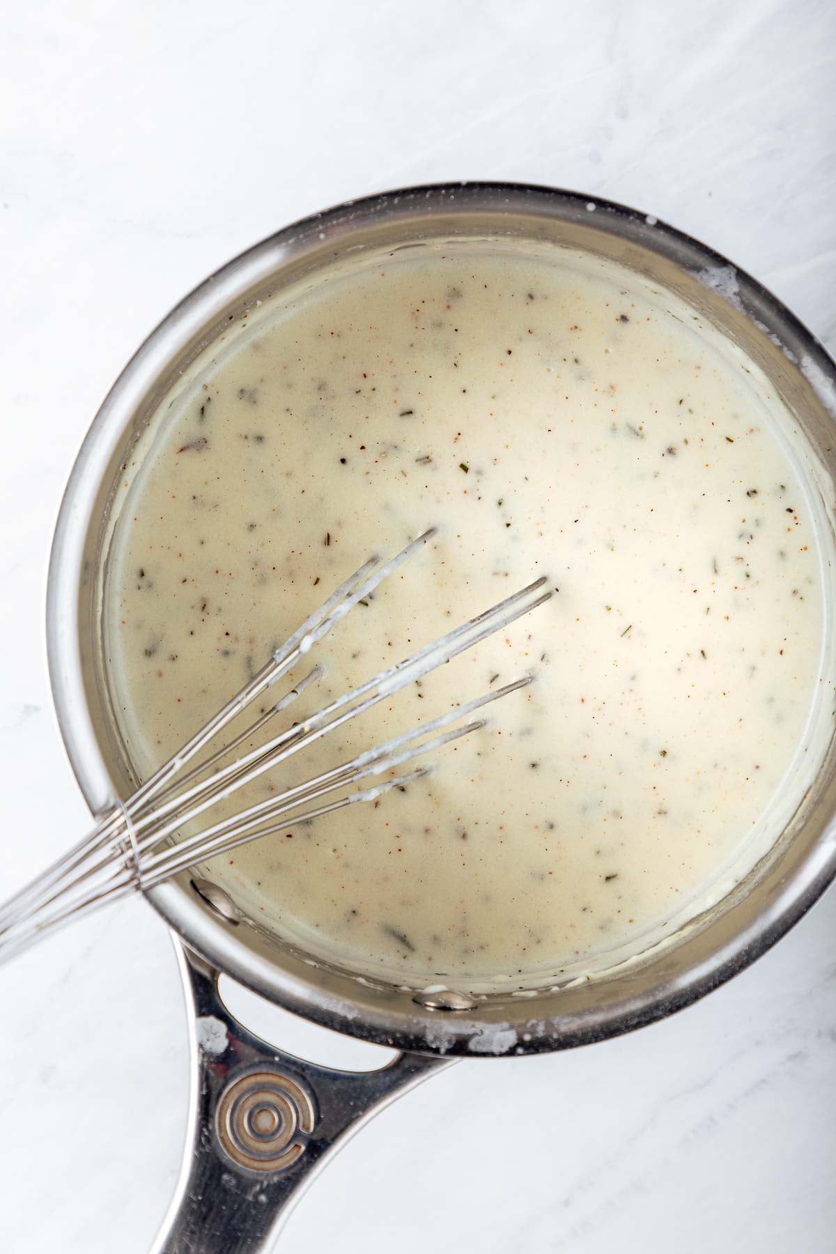 cooking the becamel sauce.