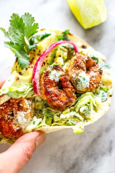 Me holding a shrimp taco.