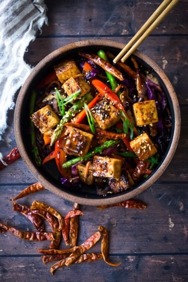 Szechuan Tofu and Veggies! A flavorful vegan stir-fry with crispy tofu, szechuan sauce and loaded up with healthy vegetables! Quick, easy and flavorful!!! #vegan #szechuan #szechwan #szechuansauce #tofu #stirfry #stir-fry