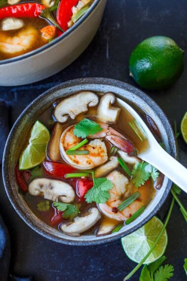 Delicious and warming, Tom Yum Soup (Tom Yum Goong) is a classic Thai soup that is best known for its clear, sour broth infused with lemongrass and galangal. Make this with shrimp, chicken or try tofu for a vegetarian option.