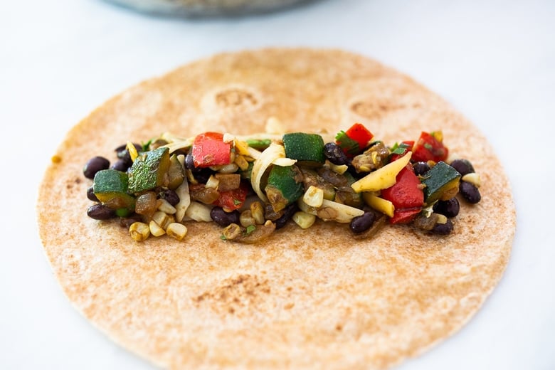 filling the enchiladas. 