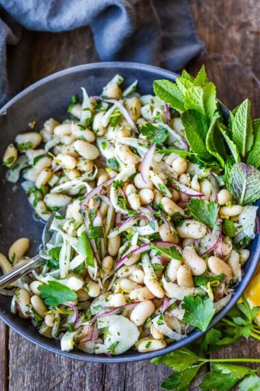 This simple white bean salad is easy to throw together, perfect for potlucks and gatherings or a quick, healthy meal! Vegan and gluten-free.